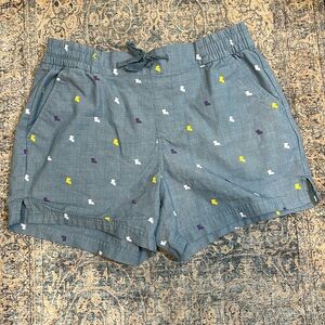 Magellan Outdoor Shorts Size Medium w/ white, yellow, and purple Louisiana